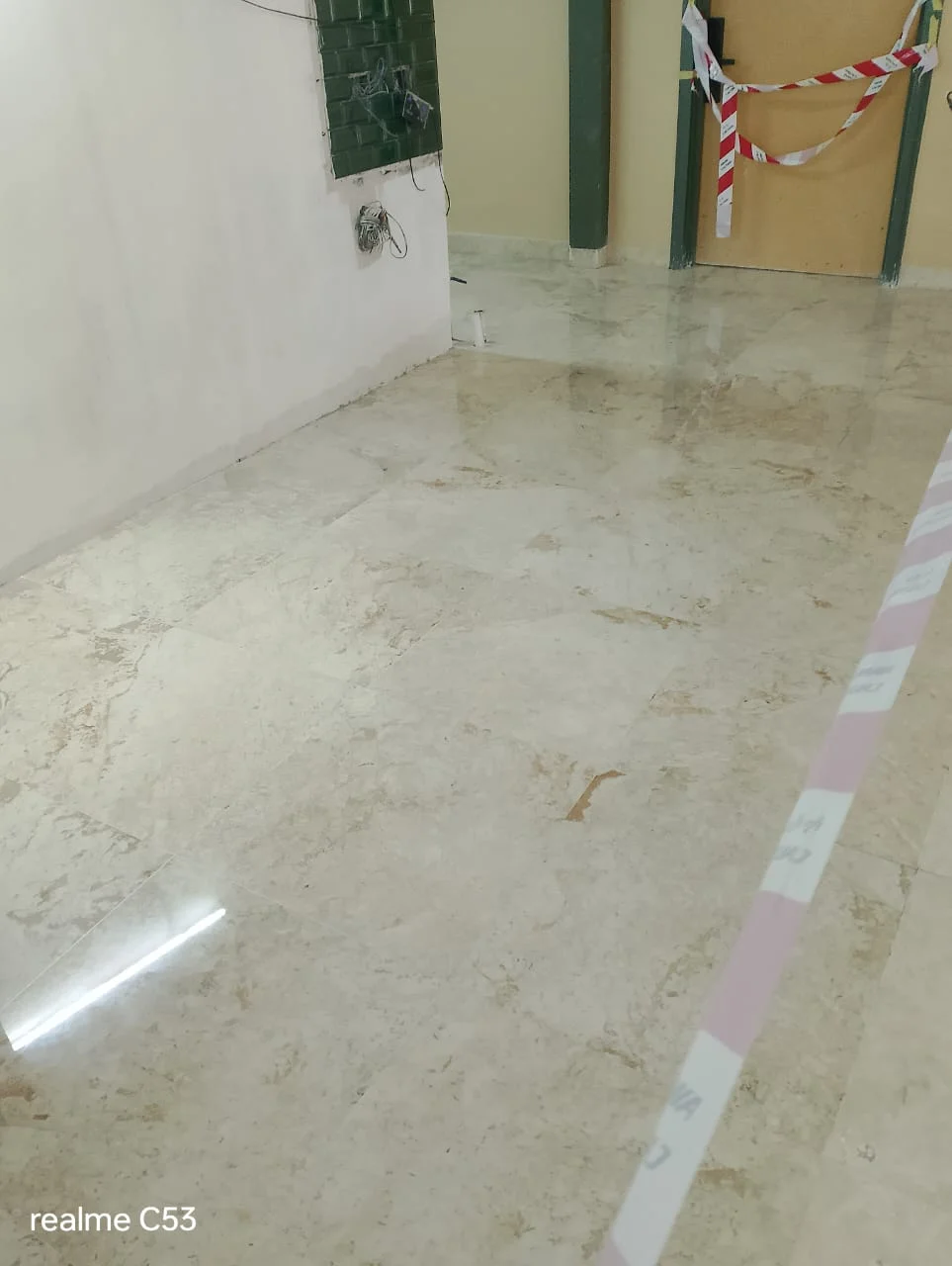 Cream Marble Floor Renovation Caution Tape