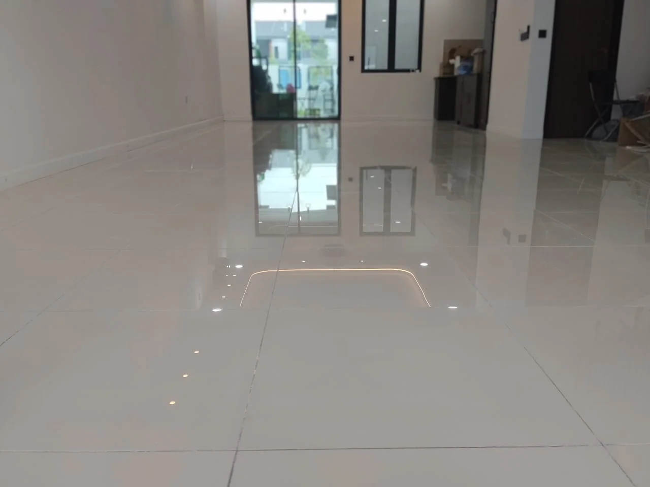 Cream Tile Floor Glass Door Reflection